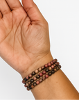 Pulsera Rodonita Veta Negra- Bola 5 mm (Goma)
