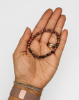Pulsera Rodonita Veta Negra- Bola 5 mm (Goma)