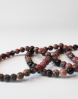 Pulsera Rodonita Veta Negra- Bola 6 mm (Goma)