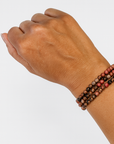 Pulsera Rodonita Veta Negra- Bola 5 mm (Goma)